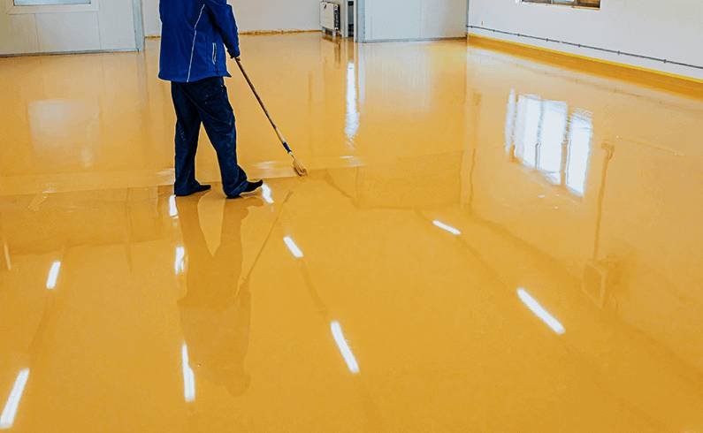 https://tremixconstructions.com/wp-content/uploads/2024/01/floor-epoxy-coating.jpg